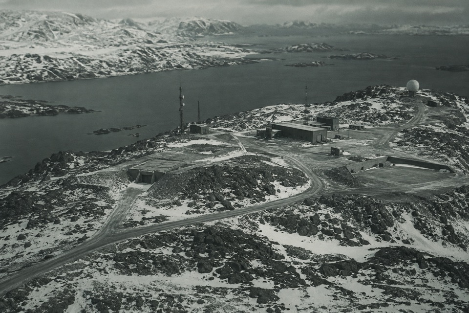 Remote northern industrial infrastructure in a cold landscape.